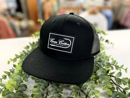 Coosa Cotton Rubber Patch Logo Trucker Snapback Hat