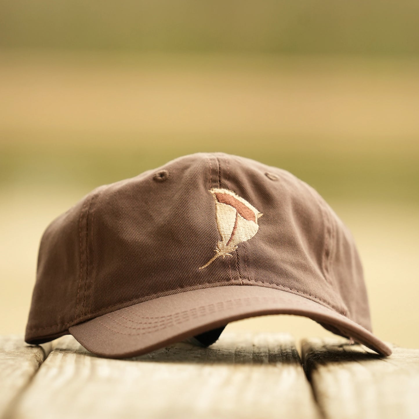 Panola Brand Feather Logo Embroidered Unstructured Solid Back Hat