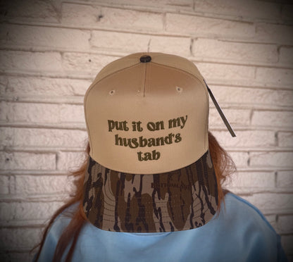 Mad Hatter Women's Put It On My Husband's Tab Trucker Hat