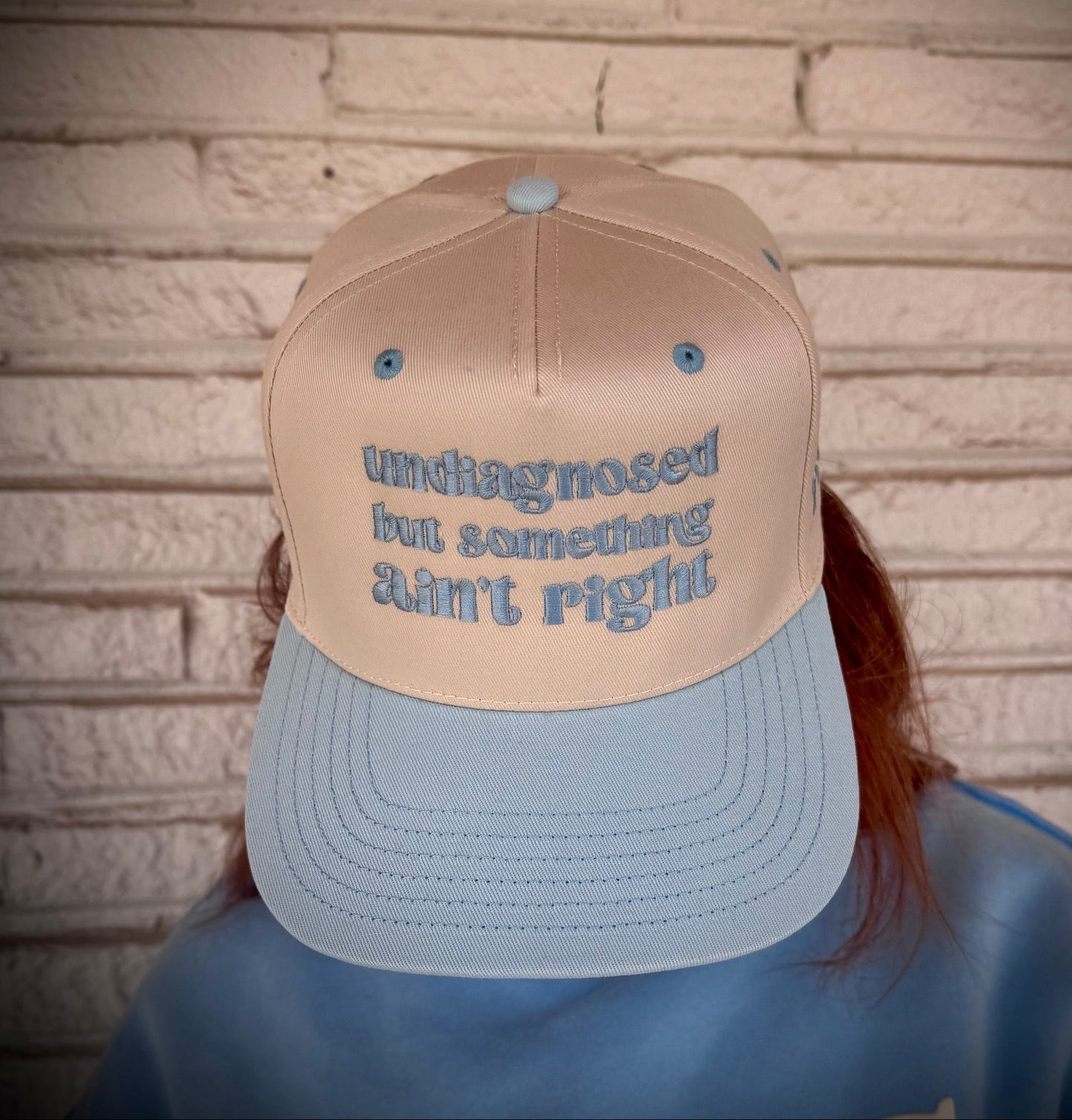 Mad Hatter Women's Undiagnosed But Something Ain't Right Trucker Hat