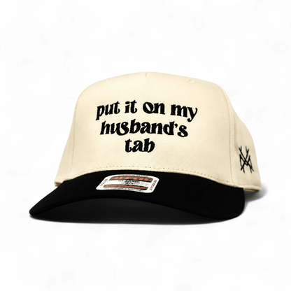 Mad Hatter Women's Put It On My Husband's Tab Trucker Hat